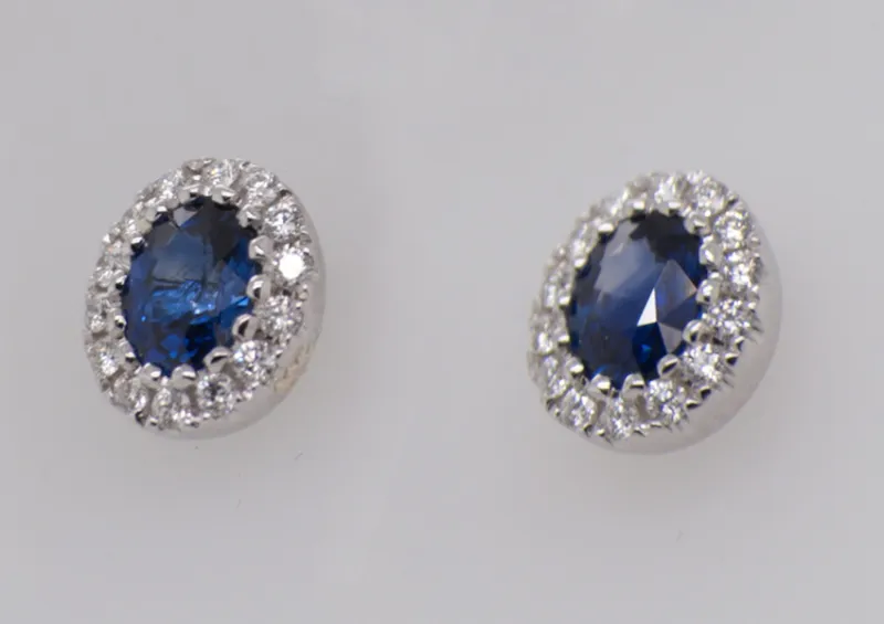 Oval Sapphire and Diamond Halo Stud Earrings in 18ct White Gold