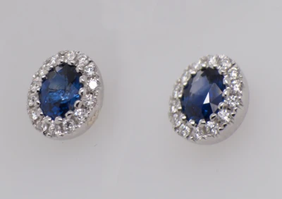 Oval Sapphire and Diamond Halo Stud Earrings in 18ct White Gold